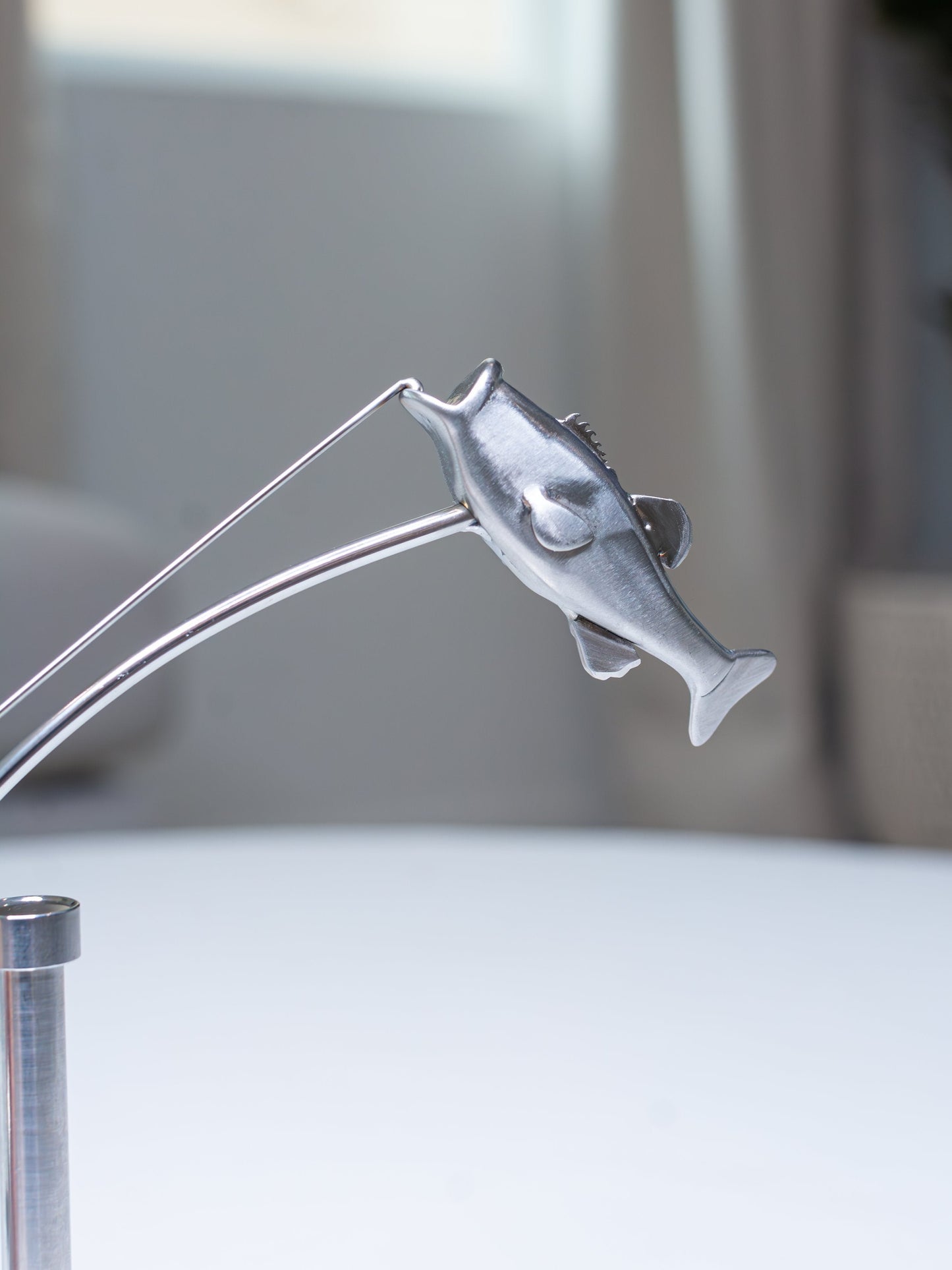 🎣Fiskeren, der balancerer skulpturen