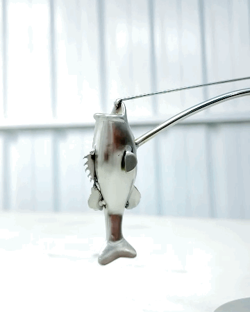 🎣Fiskeren, der balancerer skulpturen
