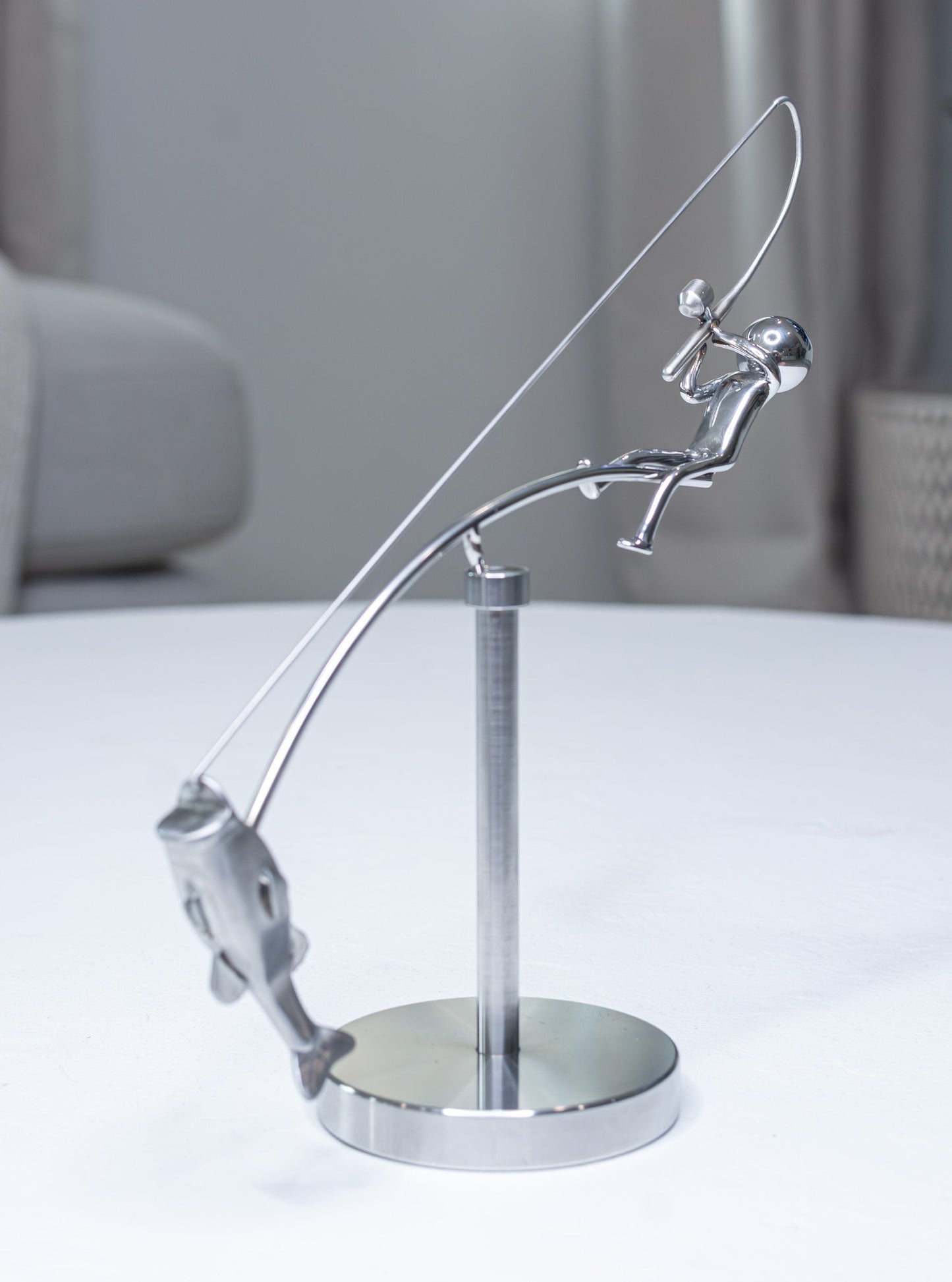 🎣Fiskeren, der balancerer skulpturen